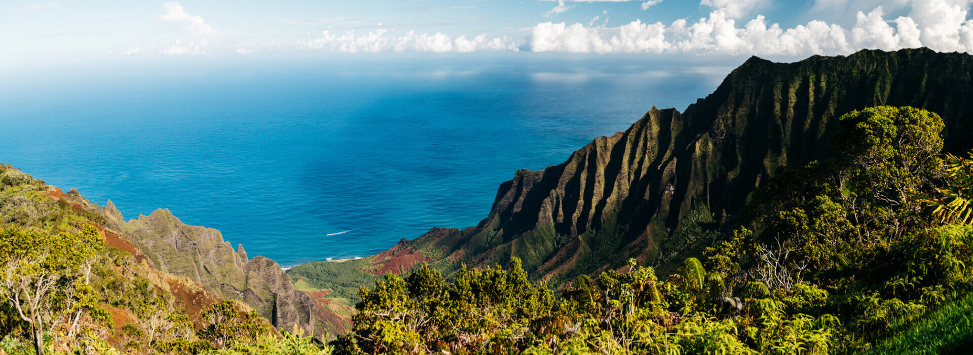 Kalalau lookout in Kauai offers stunning views of mountains and ocean