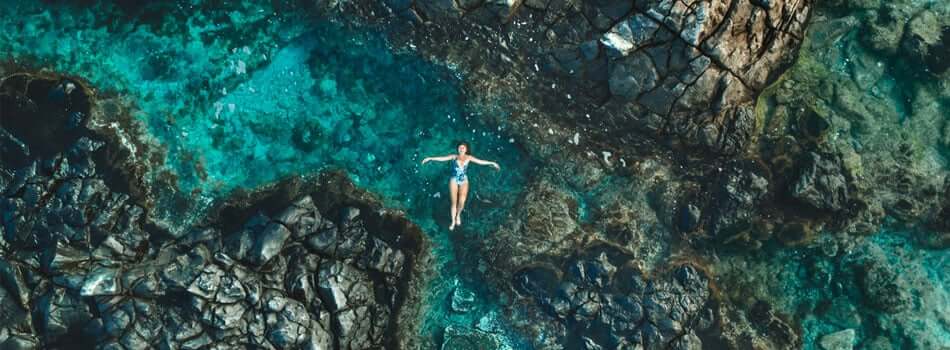 Woman floating in the Sea